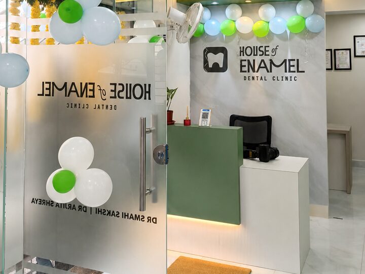 The House of Enamel clinic reception and glass entrance in Electronic City, Bengaluru